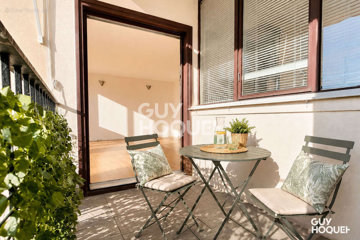 Appartement traversant de 85 m² + balcon - photo 4