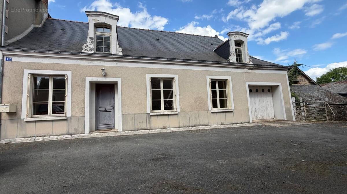 Maison à MARIGNE