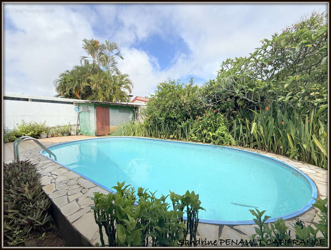 A vendre a kourou (97310) une charmante maison t5 de 106 m² - terrain de 440 m² - au prix de 318 000 € - photo 4