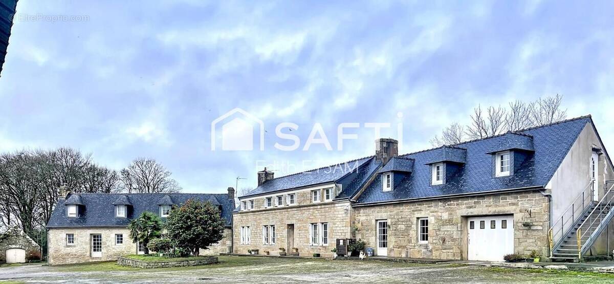 Photo 1 - Maison à PLUGUFFAN