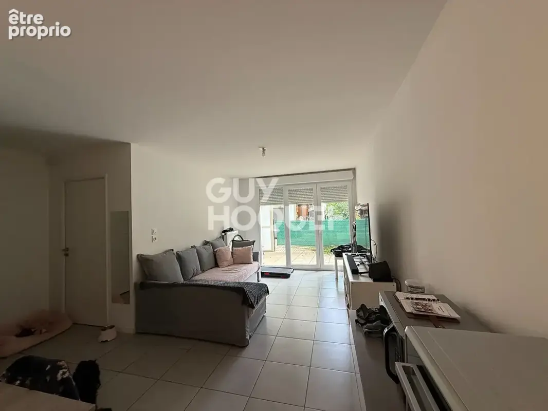 Appartement Givors 2 pieces de 41.88 m2+parking+rez de jardin VENDU LOUE - photo 2