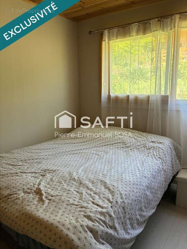 Maison 90 m² à Belmont-Luthezieu  - photo 8