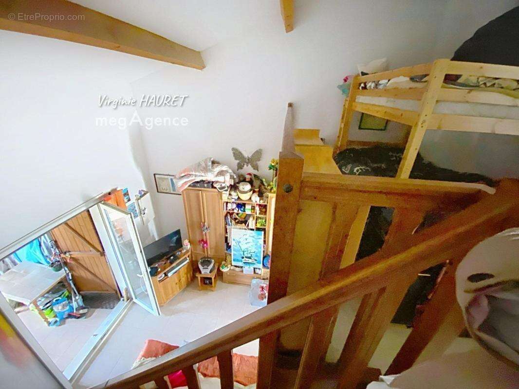 Pavillon 48m² - 1 chambre - 1 mezzanine - 1 veranda - 1 terrasse - 1 place de parking- jolie vue - photo 10