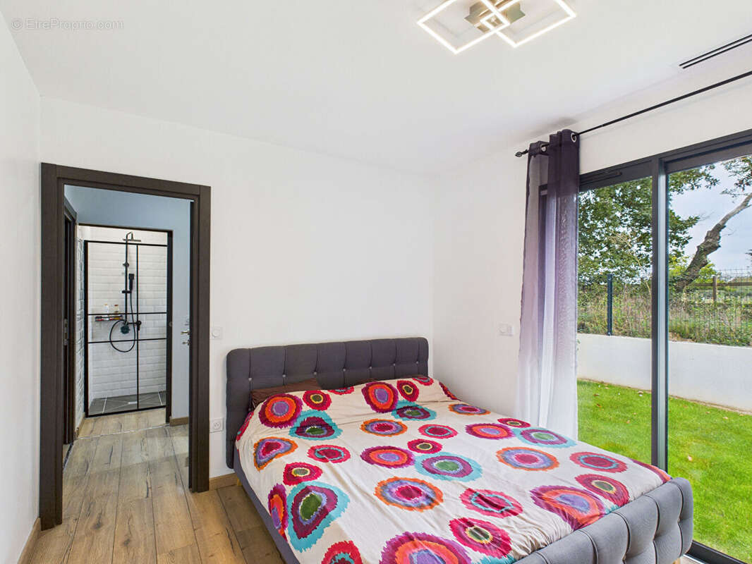 MAISON CONTEMPORAINE RT2020 5 pièce(s) 136 m2 ur 580m² terrain ROMANS SUR ISERE 26100 - photo 9