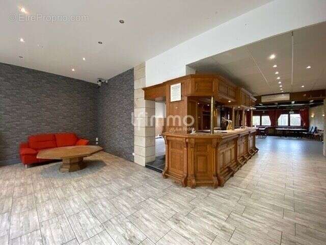 Immeuble comprenant un local commercial et deux appartements - photo 7