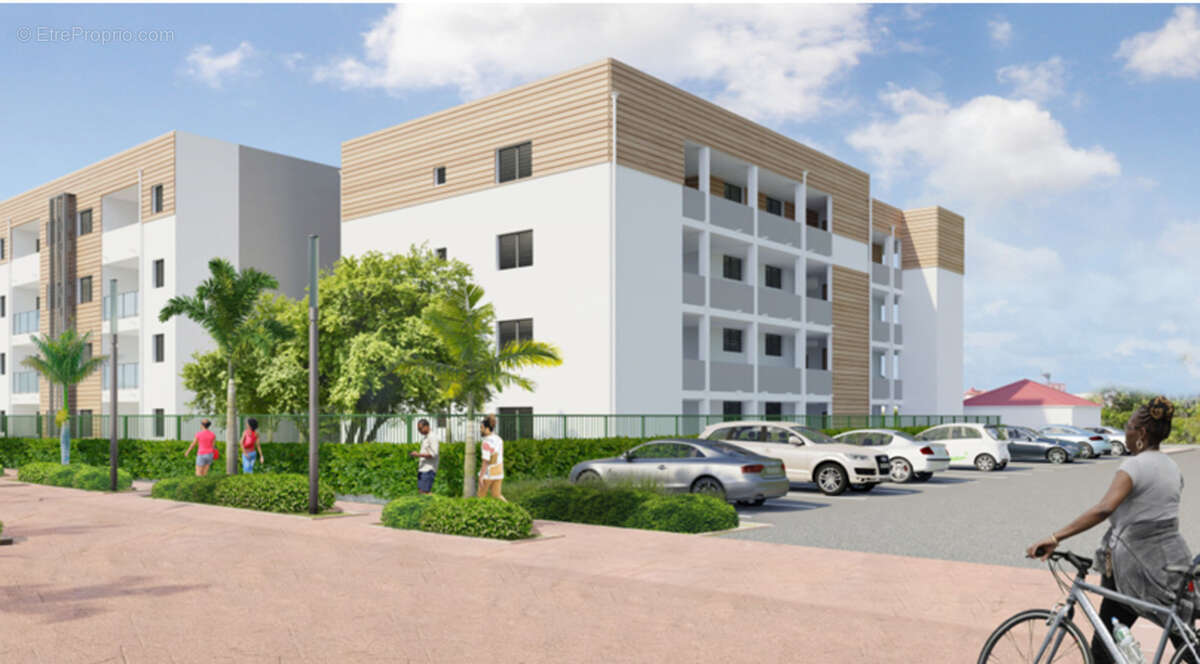 A VENDRE appartement T3 face piscine et face mer en RDC à Moule - photo 4