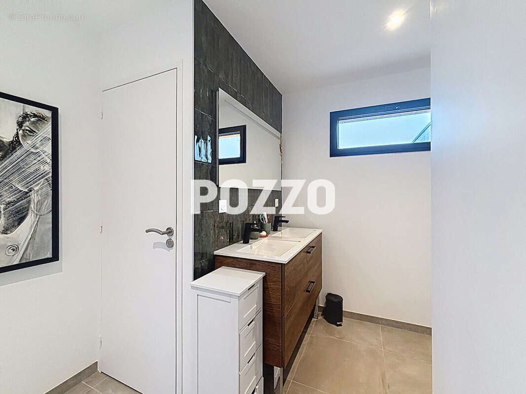 Maison à AGON-COUTAINVILLE