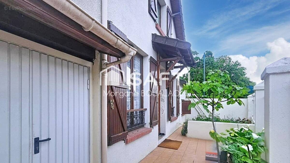 Photo 1 - Maison à GENNEVILLIERS