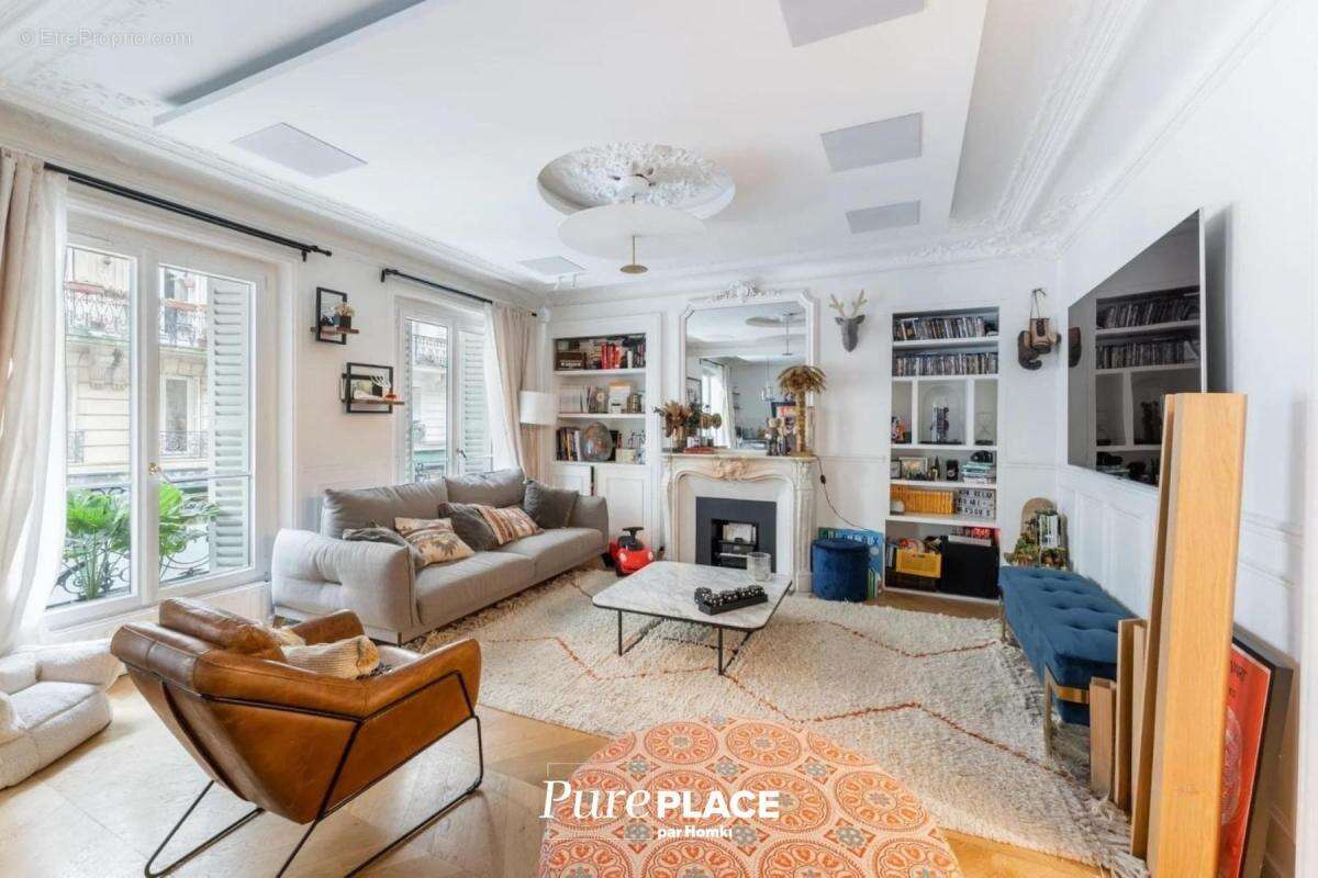 Appartement T5 de 92 m² à Paris 75010, Rue Perdonnet - photo 2