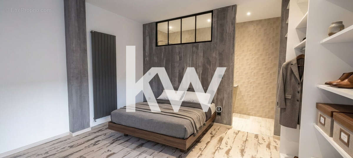 Maison 155 m² à Saint-Genest-Lerpt  - photo 7