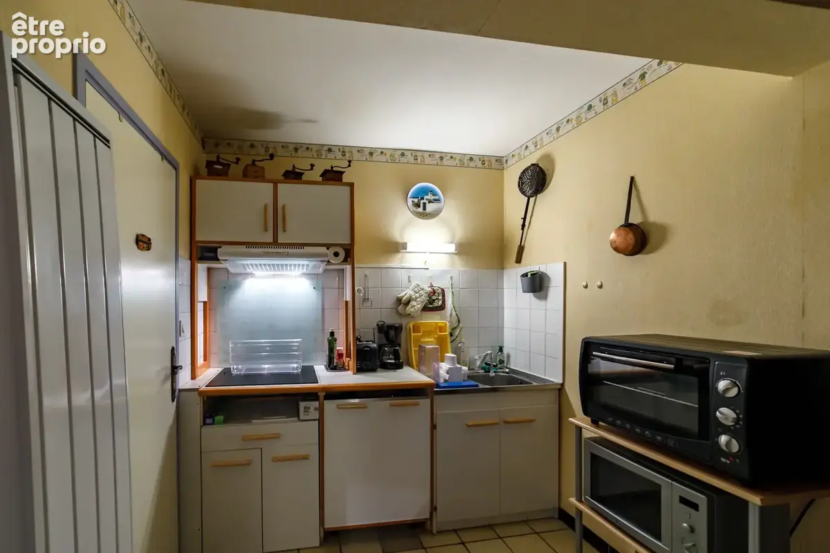 Appartement 2 pièces - place de parking intérieure et cave - 51000 euros - photo 3