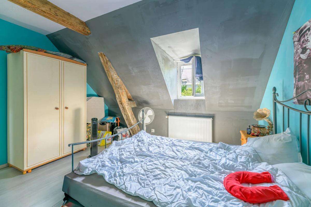 Maison de 5 pièces de 102 m² à Villechauve - photo 11