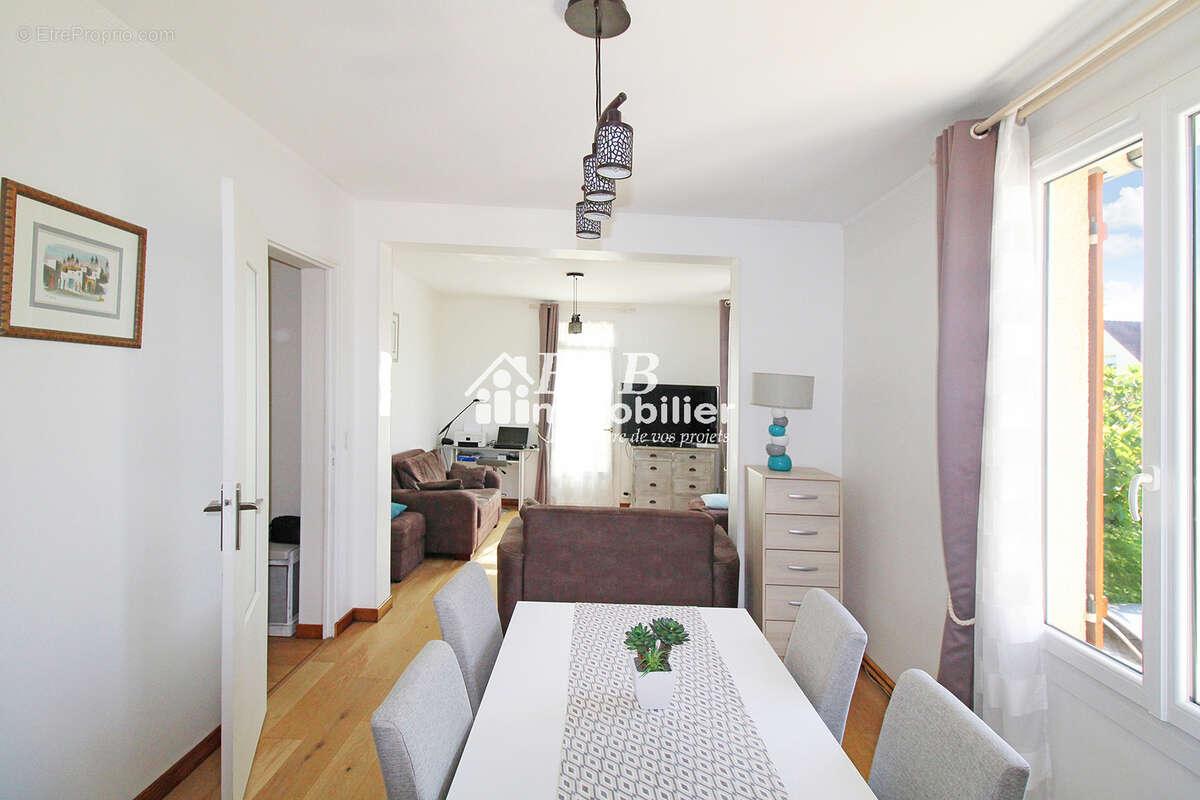 Maison de plain-pied 94m2  3 chambres + garage - photo 5