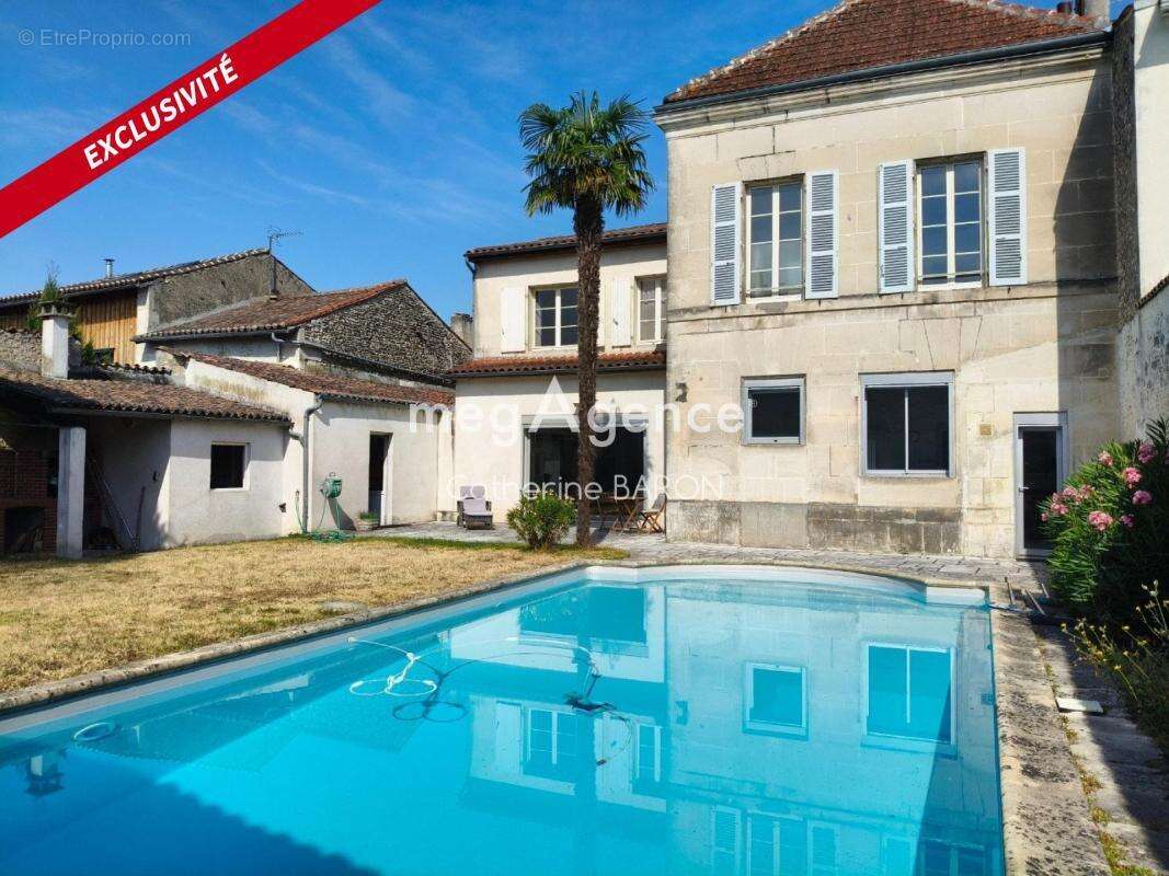 Maison à COGNAC