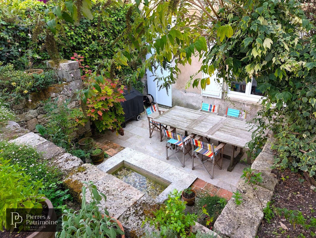 Sublime propriété au cœur de Mézin avec jardin, garage et dépendances - photo 10