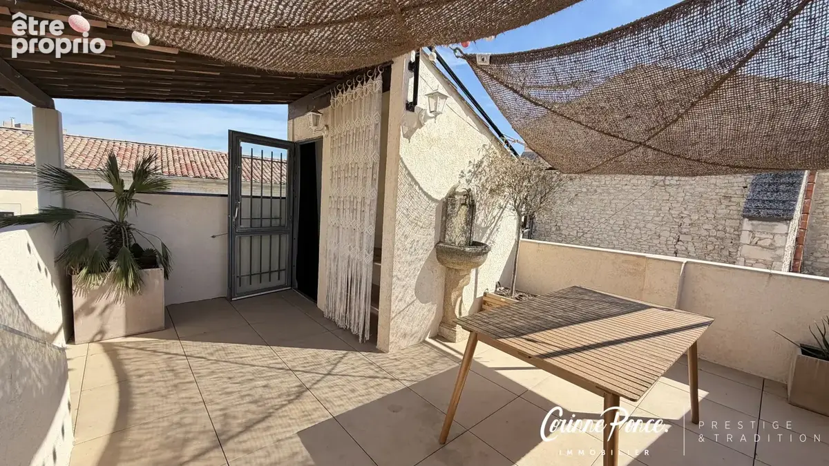 Nimes centre appartement / maison de ville  141 m2 avec garage et terrasse en rooftop propose par corinne ponc - photo 2