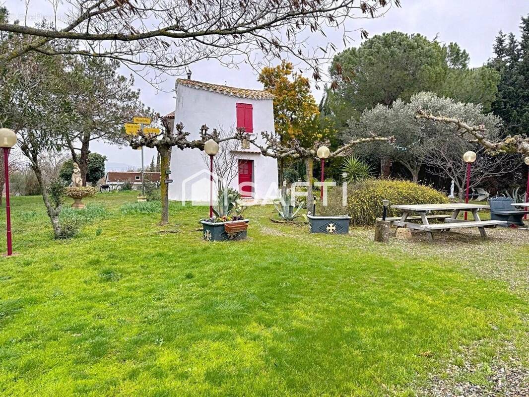 Photo 1 - Commerce à MARSEILLETTE