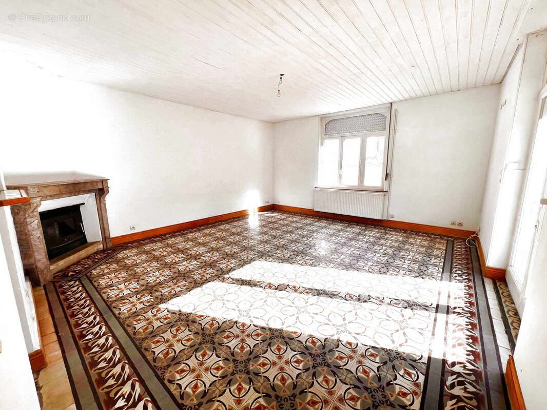 Maison à BONNINGUES-LES-CALAIS