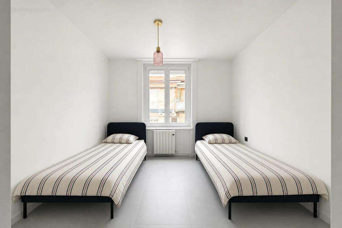 Appartement de 4 pièces de 109 m² à Saint-Étienne - photo 8