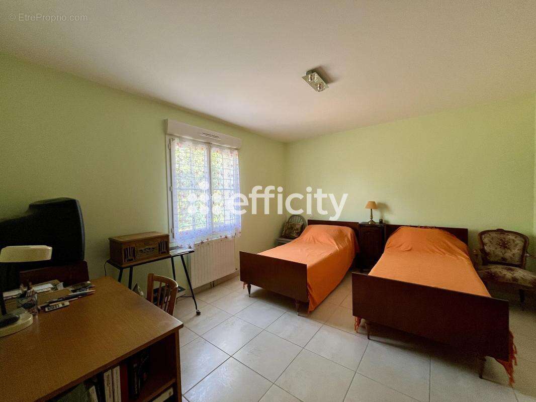 Maison 80 m² à Buxerolles  - photo 10