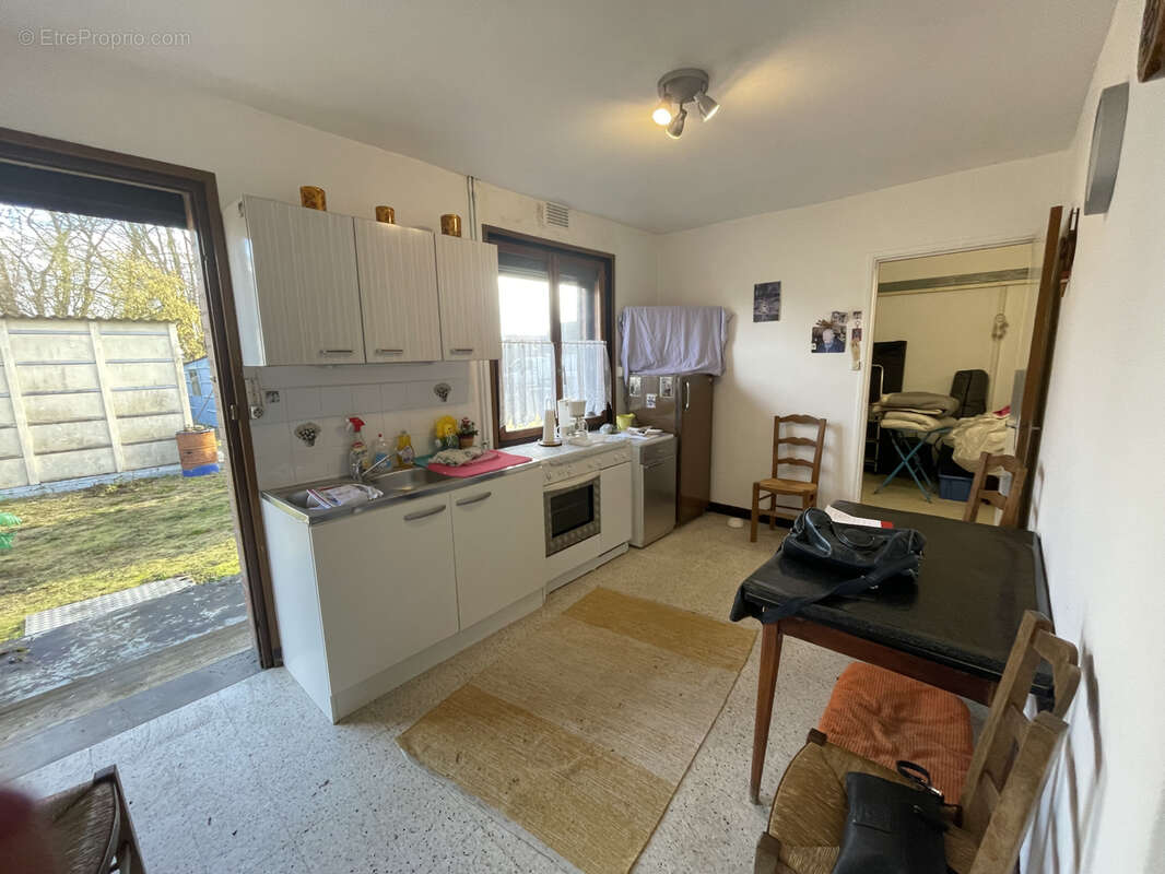 Maison à QUEVAUVILLERS