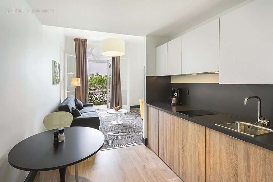 INVESTISSEMENT LOCATIF  Nîmes  Appart'city Collection Nîmes Arènes  5,53 % de rentabilité - photo 3
