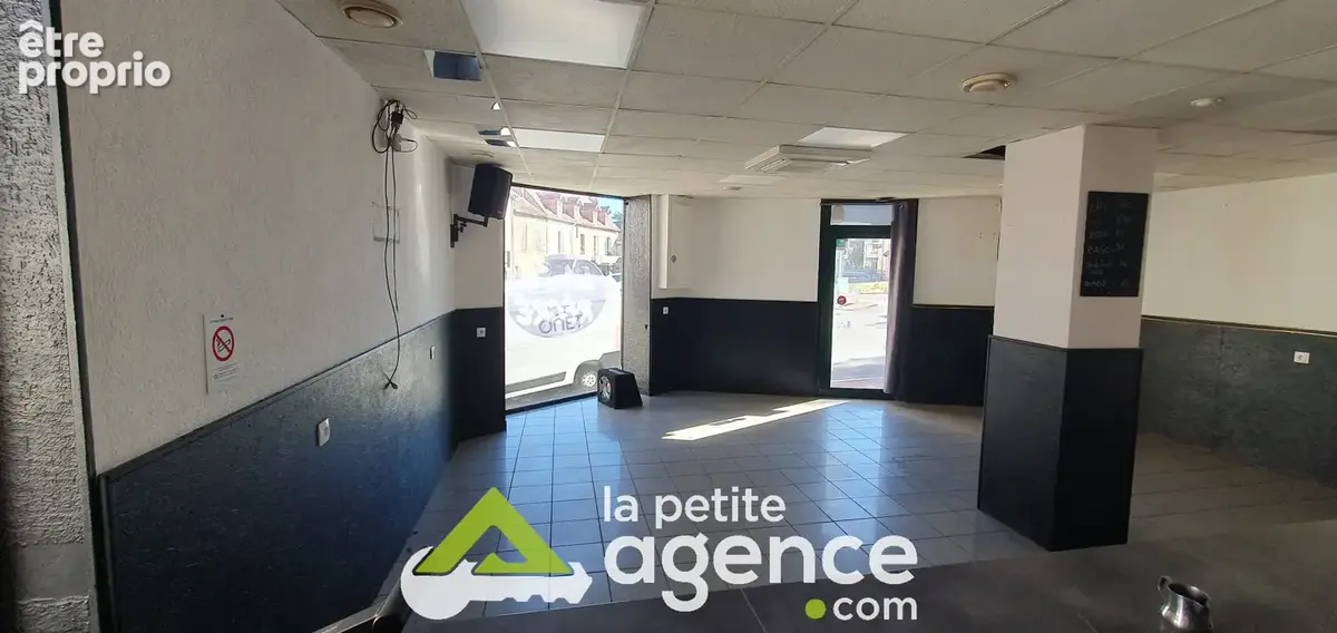 Immeuble de rapport avec local commercial bien situé - photo 5