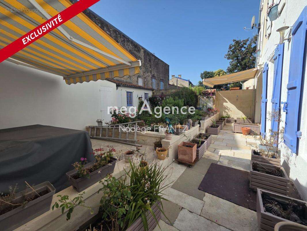 Maison cœur de ville St jean d'Angely avec garage - photo 17