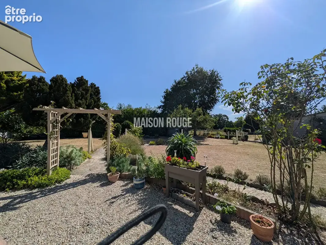 Élégante maison en pierres rénovée à Saint-Lormel avec 4 chambres et vaste terrain constructible - photo 16