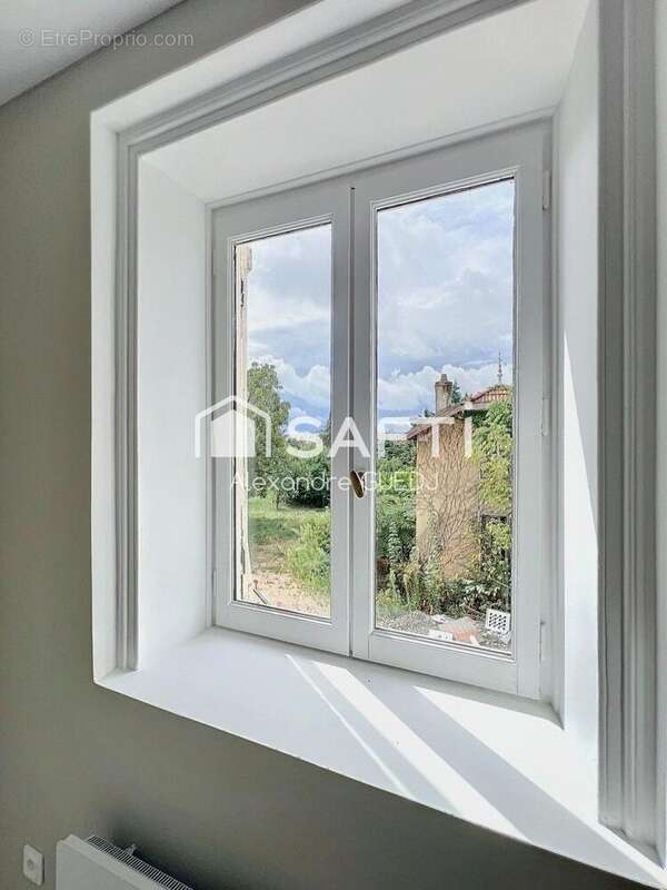 Photo 2 - Appartement à RILLIEUX-LA-PAPE