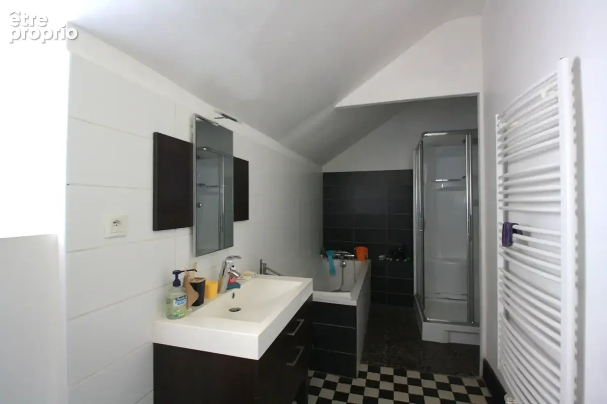 Charmante maison de style 1930, 4 chambres, à proximité des commodités - photo 6