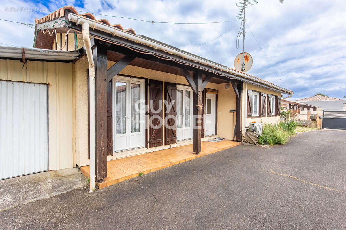 Maison trois chambres avec garage et carport - photo 12