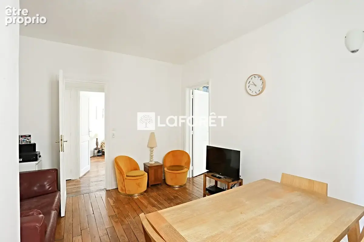 Appartement Paris 3 pièces de 51m² - photo 2