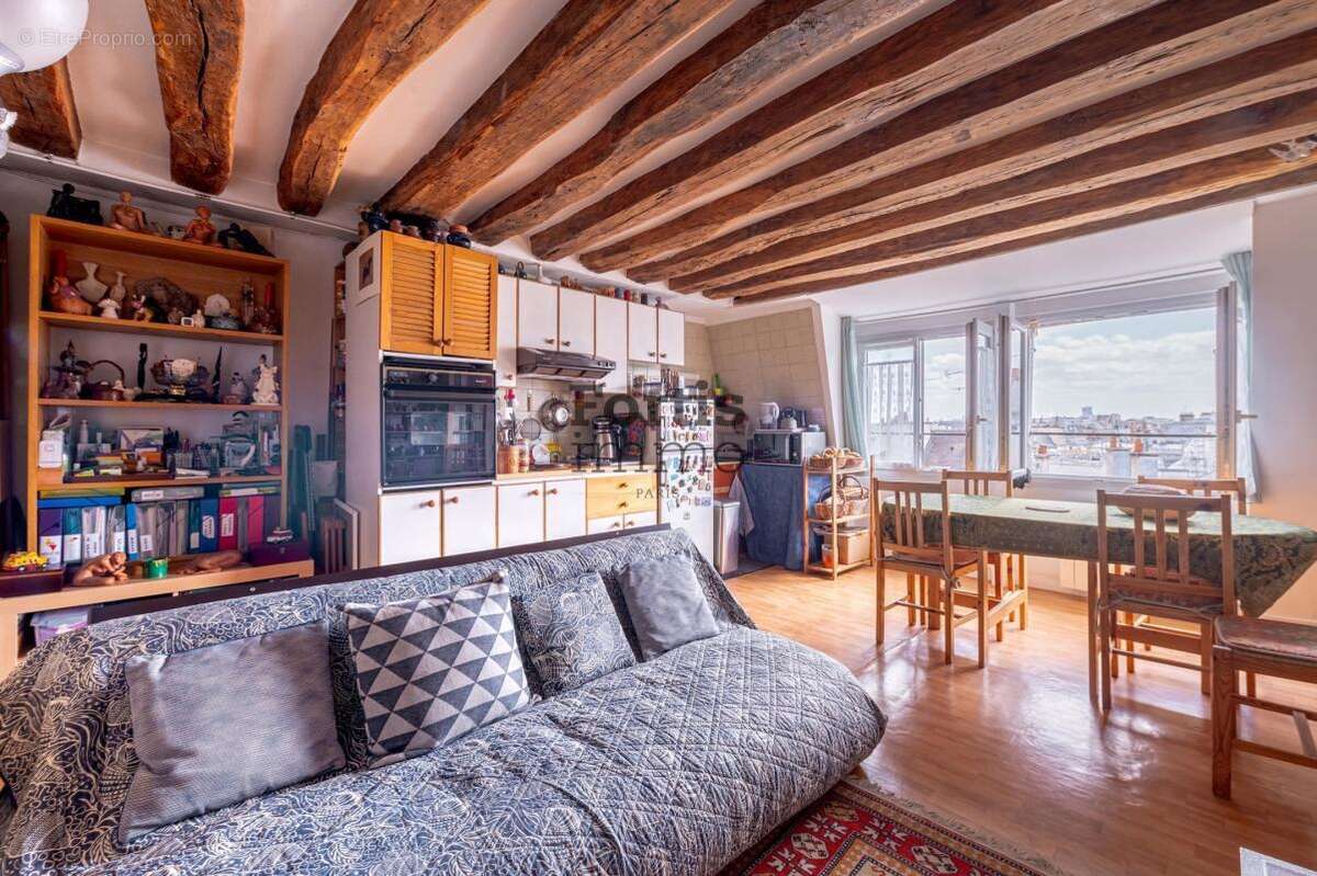Paris 2 - duplex de 3 pieces, dernier etage avec vue degagee - photo 2