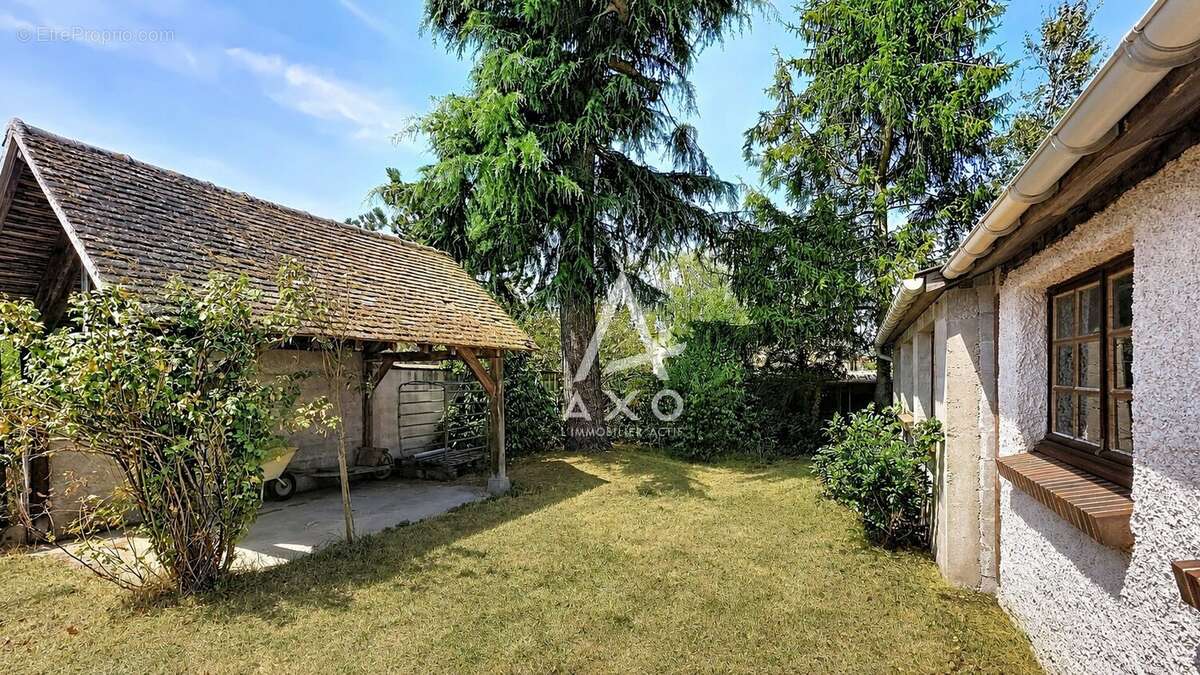 A Vendre à AMILLY  Maison de charme avec séjour cathédrale et dépendance de plus de 70 m² - photo 13