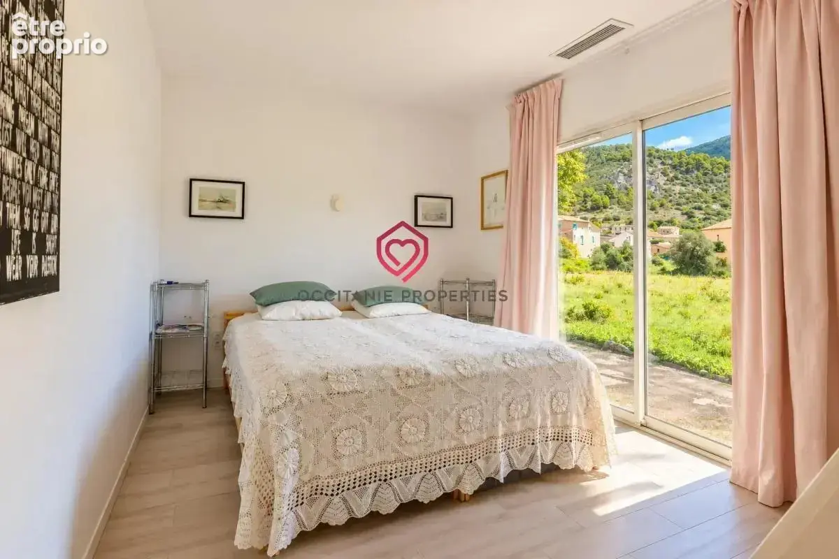 Villa récente de plain-pied avec piscine et vue sur Roquebrun - photo 12