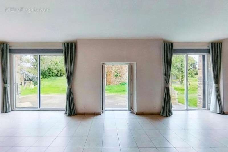 Maison à LA BOUEXIERE