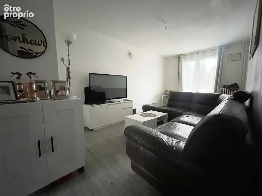 Appartement T4 avec balcon et cave - photo 2