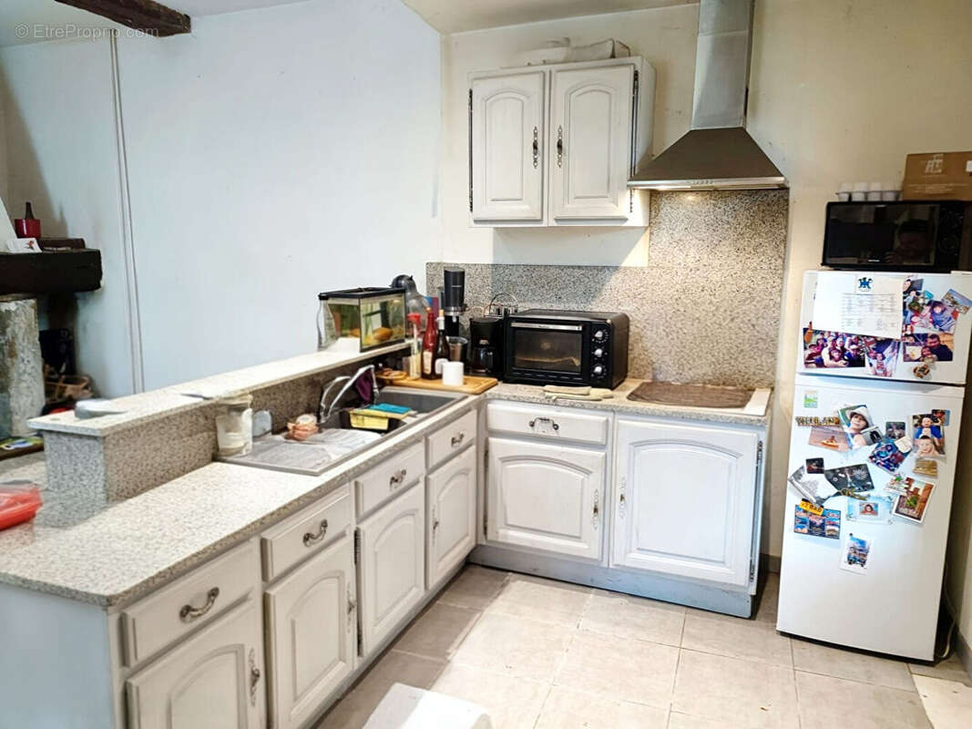 Ensemble immobilier avec 2 maisons (3 logements), garages et terrains constructibles. - photo 12