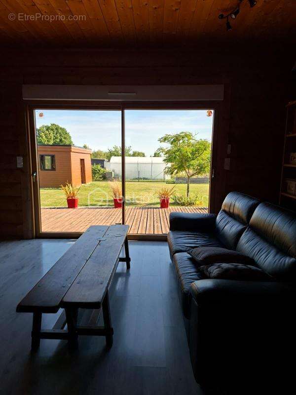 Maison en rondins de bois - photo 7