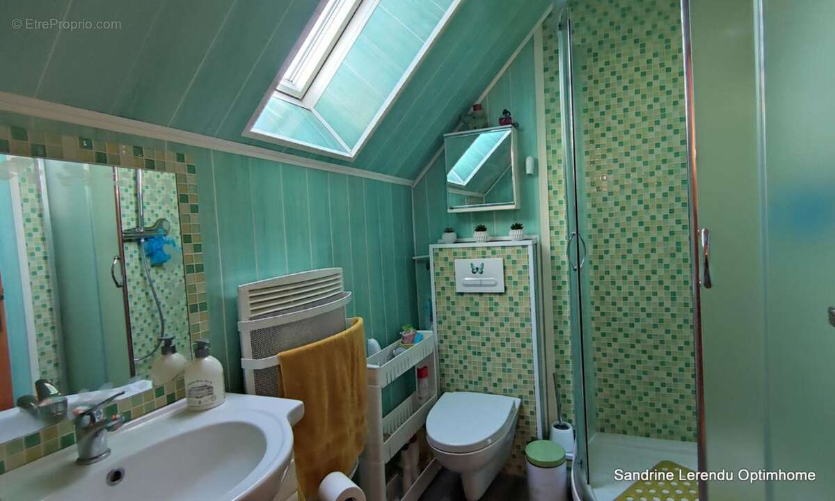 Une maison clé en main avec véranda contemporaine et possibilité de vivre de plain-pied. – 2 garages – Terrain 807 m² – Saint-Ou - photo 20