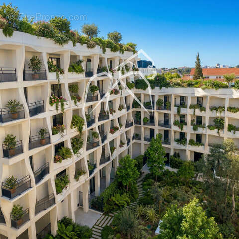 Appartement  4 pièces  Montpellier ECO-QUARTIER EAI / Parc Montcalm  99m² - photo 7
