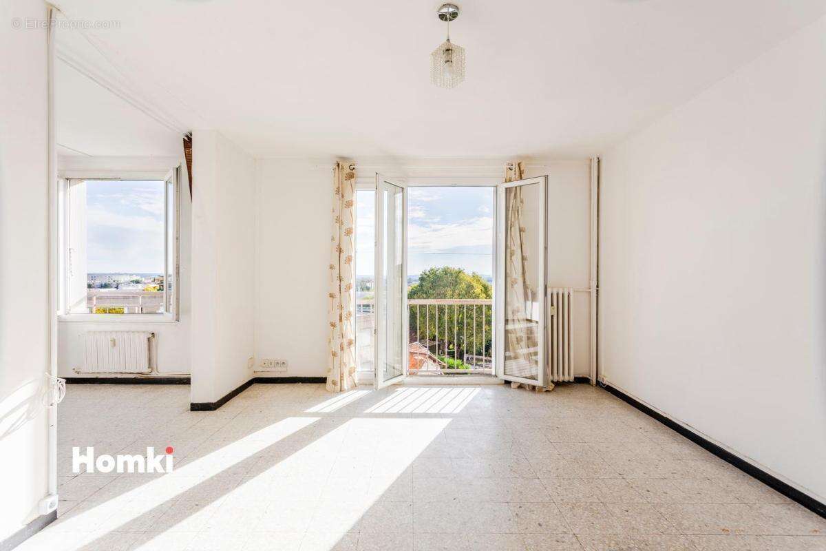 Appartement 3 pièces de 69m2 avec parking et vue à Nîmes Jean-Jaurès - photo 2