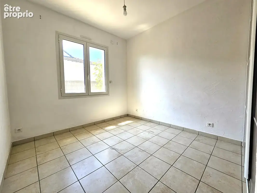 Maison 110 m²  avec 2 chambres, jardin et garage - photo 11