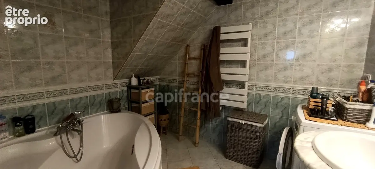 Virginie Masson – Capifrance vous propose cette maison en pierre de 92 m² pleine de charme, située à Seignelay, proche des comme - photo 26