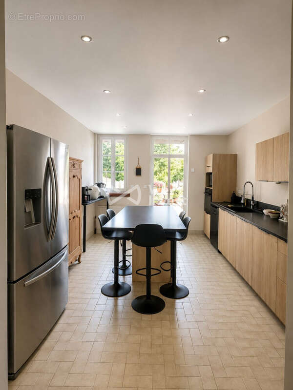 Maison 104 m² à Saint-Julien-Des-Landes  - photo 2