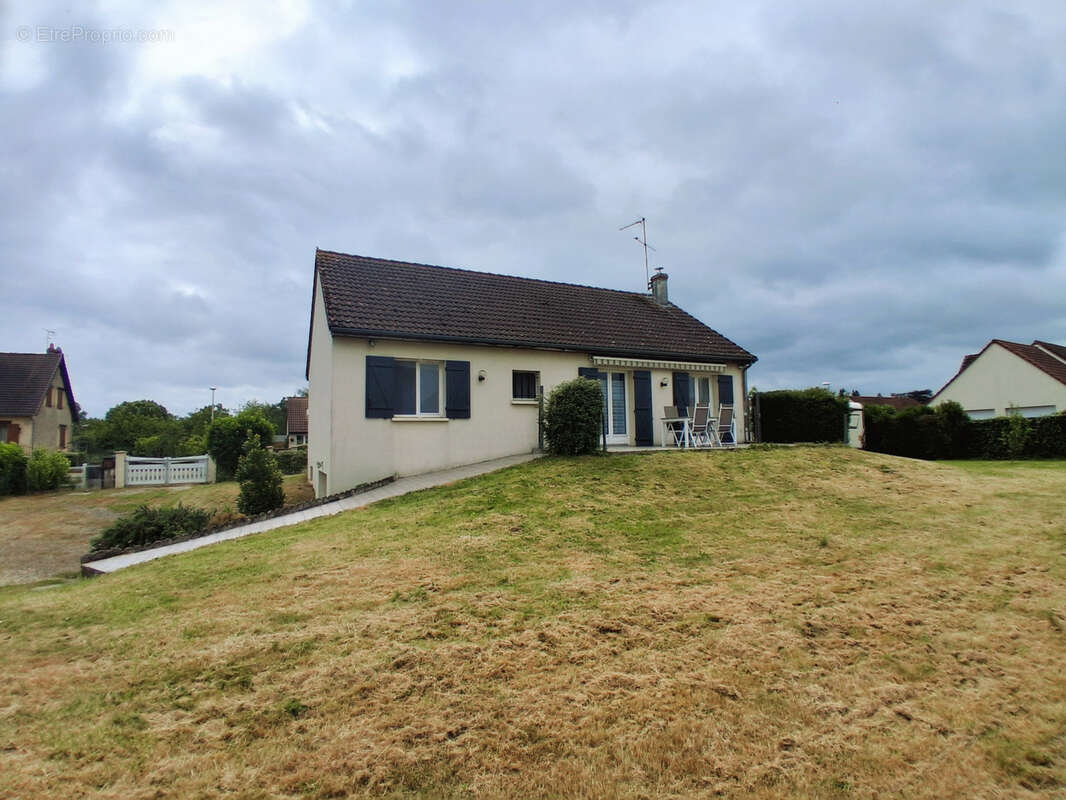 Maison sur sous sol avec garage et jardin - photo 5