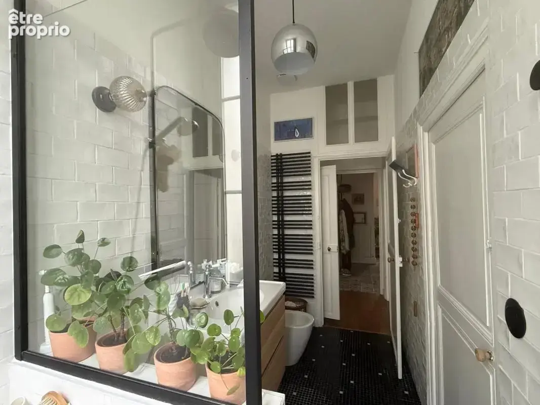 Un appartement de caractère au cœur de la ville - photo 9