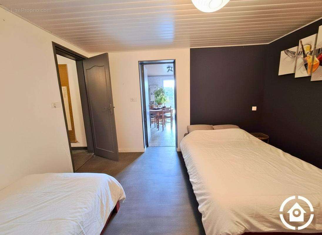 Maison sur sous sol - 3 chambres - jardin - garage - photo 14