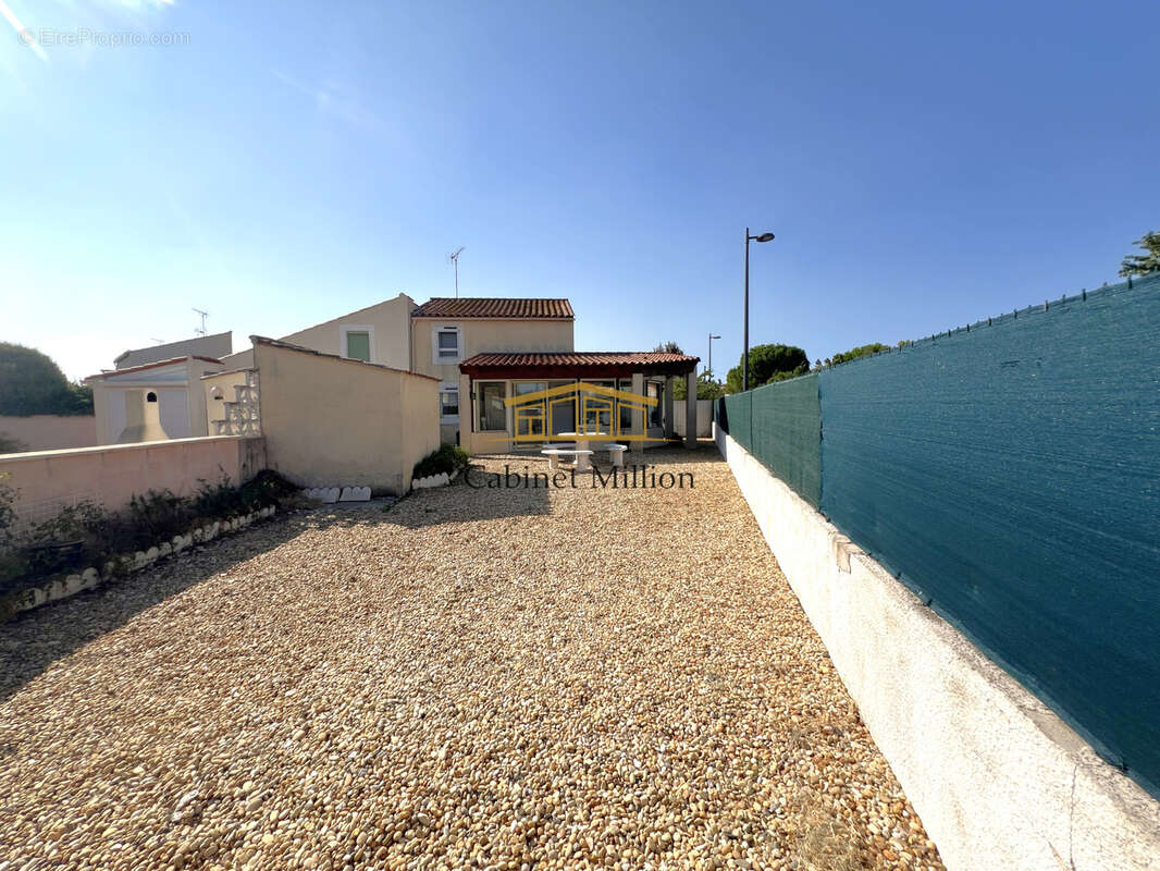 Maison T3 en résidence sécurisée - photo 2